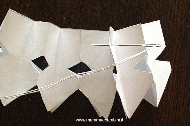 Realizzare festone con stelle di Natale 18 stella-natale-festone14