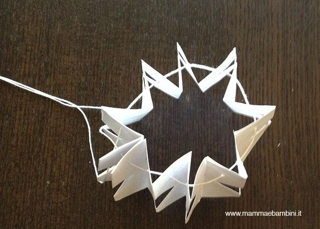 Realizzare festone con stelle di Natale 20 stella-natale-festone16