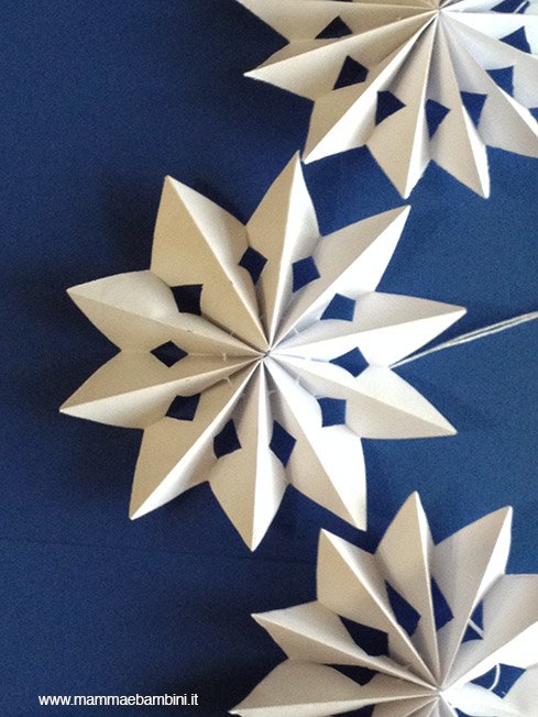 Realizzare festone con stelle di Natale 23 stella-natale-festone21