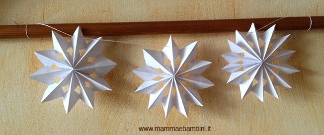 Realizzare festone con stelle di Natale 2 stella-natale-festone22